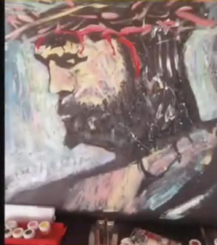 Speed painting of Christ wearing the crown of thorns on an easel, with paint pots on the work table before it